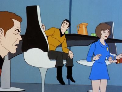Animated Star Trek scene of a shrunken crewman on a giant chair beside Kirk and a crewwoman