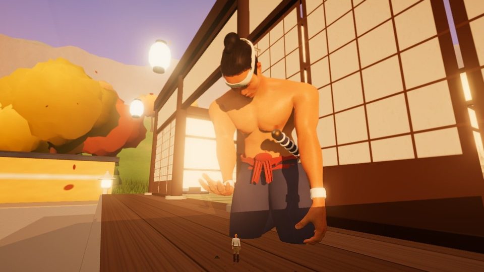 Land of Size: Four inches tall, with Kenji kneeling to lift him